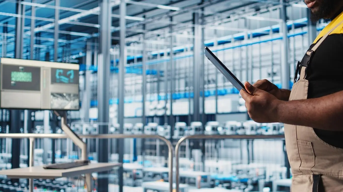 Industry 40 photovoltaics plant administrator using an app on a digital device